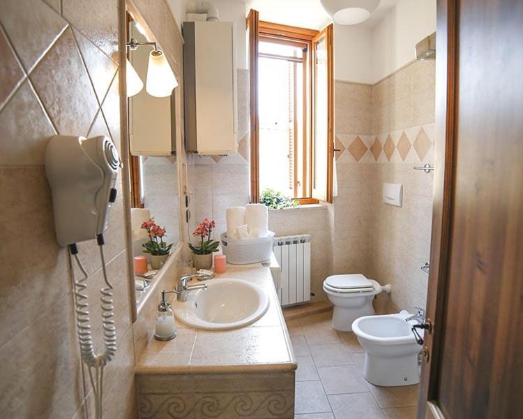 Palazzo Le Muse Apartments Беванья Екстер'єр фото